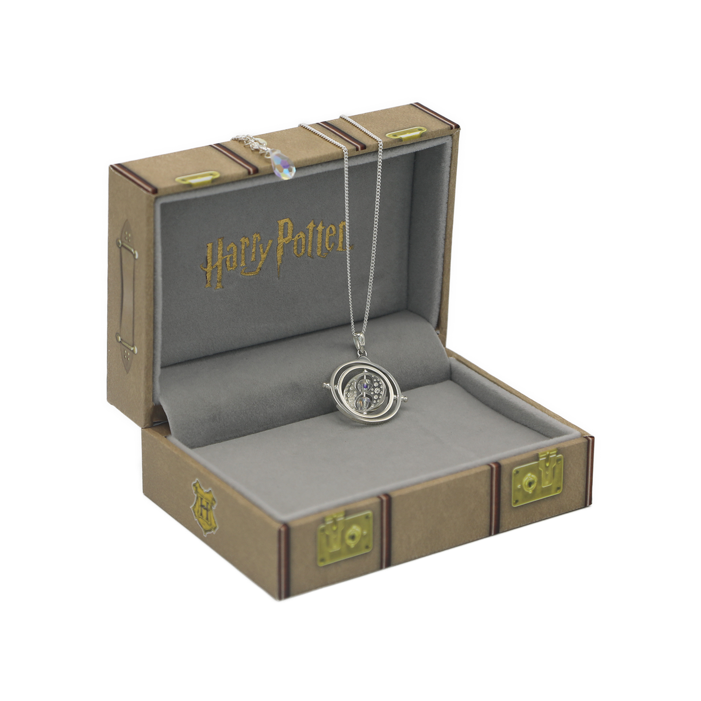 Harry Potter-themed necklace in an open box with 'Harry Potter' branding.