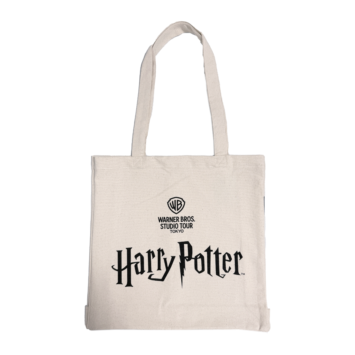 Beige tote bag with 'Harry Potter' and Warner Bros. Studio Tour logo on a white background