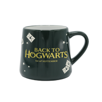Dark green mug with 'Back to Hogwarts' text and design elements on a transparent background