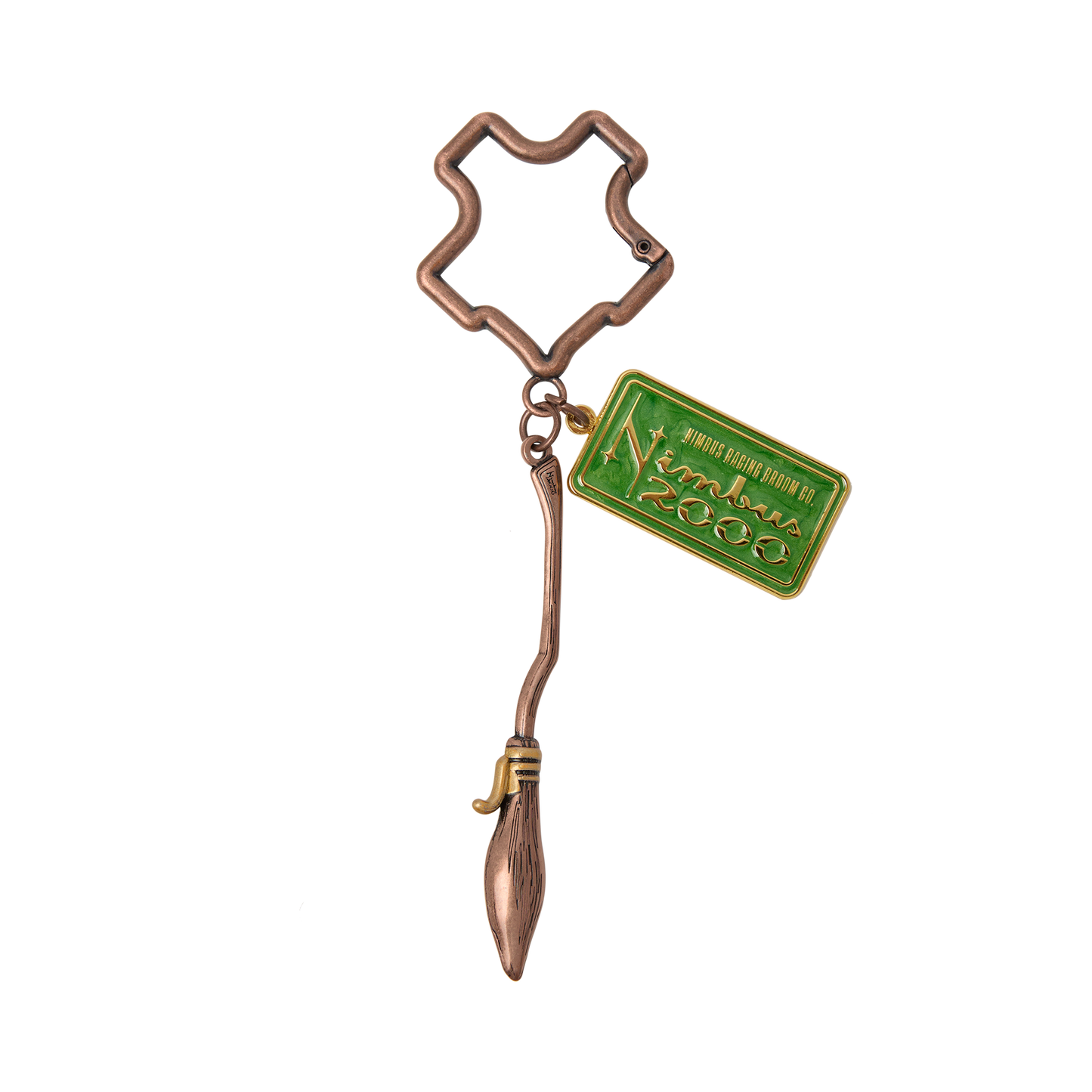 Bronze Nimbus 2000 keychain with a green tag on a white background