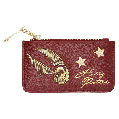 A small zippered pouch in textured burgundy faux leather with gold embroidery featuring the Golden Snitch, two stars, and the script 'Harry Potter'.