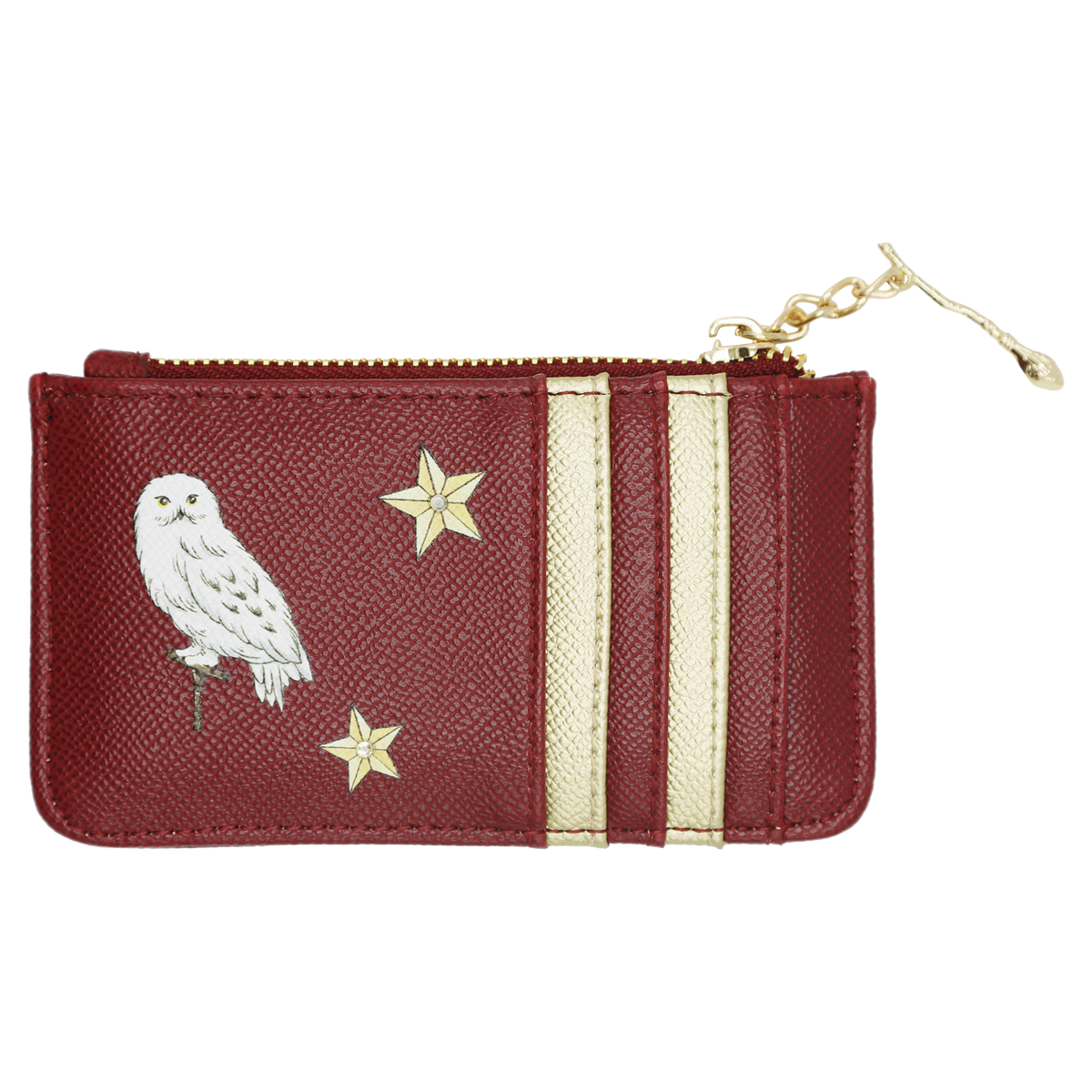 A small zip-around pouch in textured burgundy leather with cream vertical stripes, a white Hedwig applique, and two gold stars. A Nimbus 2000 charm is attached to the zipper.