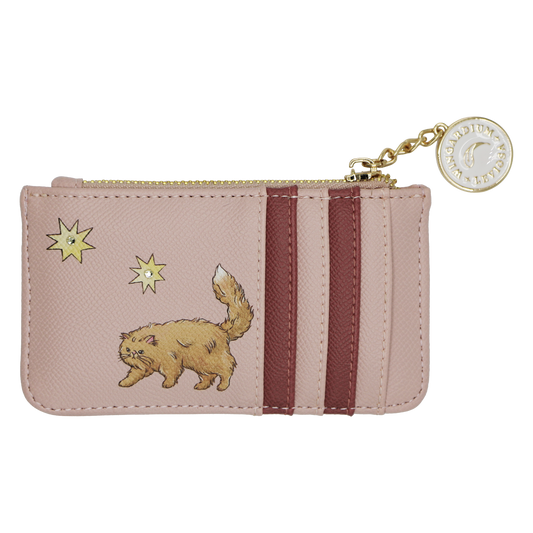 A small zip-around pouch in pale blush pink textured leather with two vertical dark burgundy stripes, a gold zipper, and a charm with a spell illustration. The front is decorated with Crookshanks and two yellow stars.